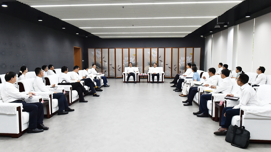 張國華與郵儲銀行行長劉建軍一行舉行工作座談